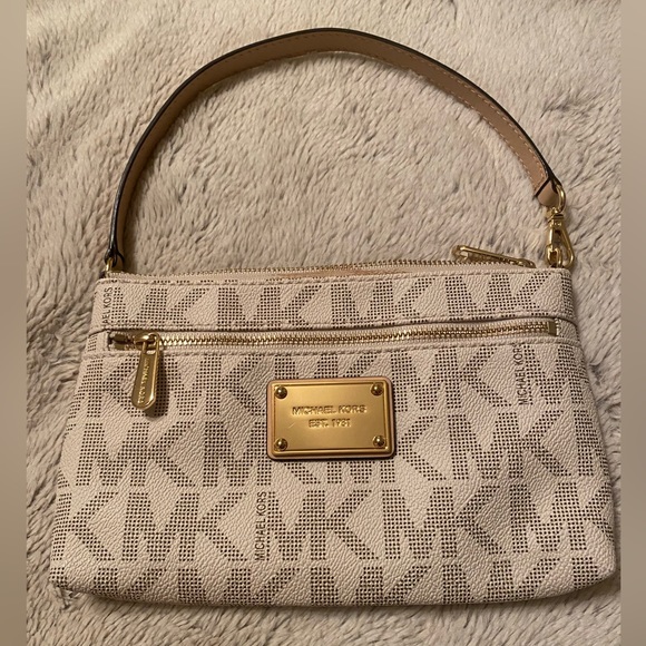 Michael Kors cream and tan wristlet, gold hardware, like new. - Picture 2 of 5
